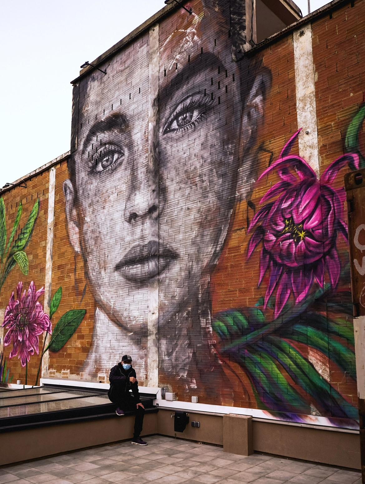 I PUT A HUMAN FACE ON A BIG WALL